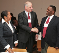 Dean Poor meeting conference attendees