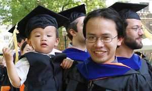 Graduate and child