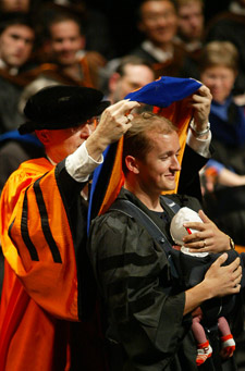 Graduate and child