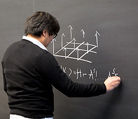 Garnet Chan at board