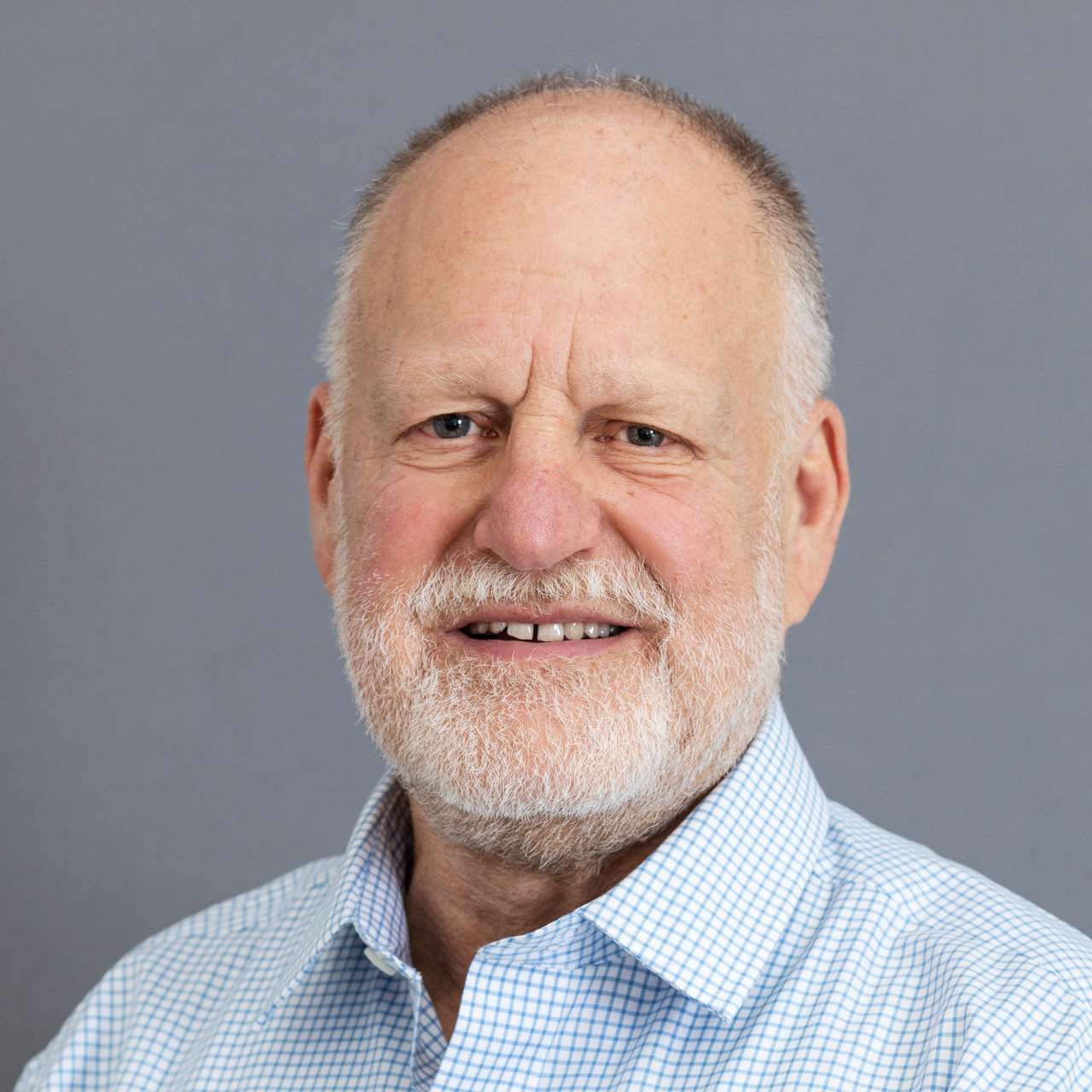 Henry Farber smiling.