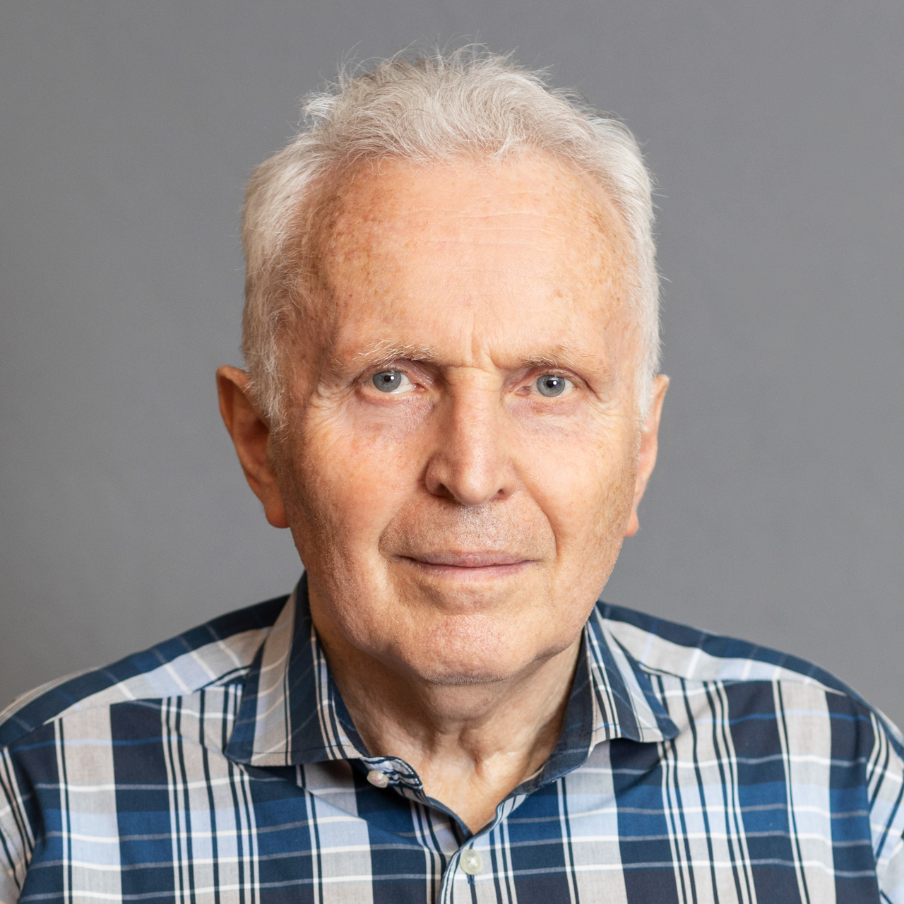 Alexander Polyakov smiling.