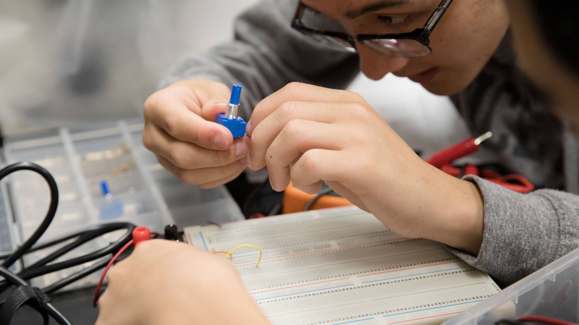 Student working on circuit board