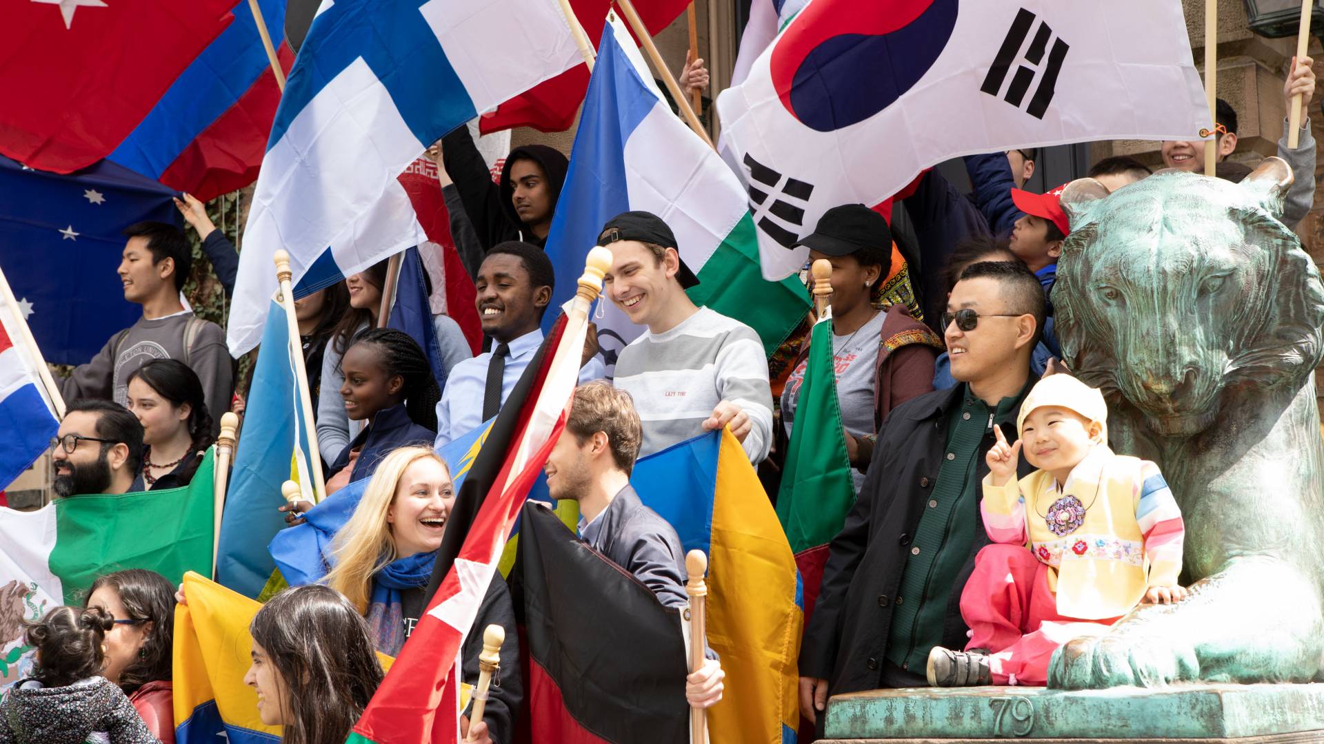 International Parade of Flags standing on Nassau Hall front steps