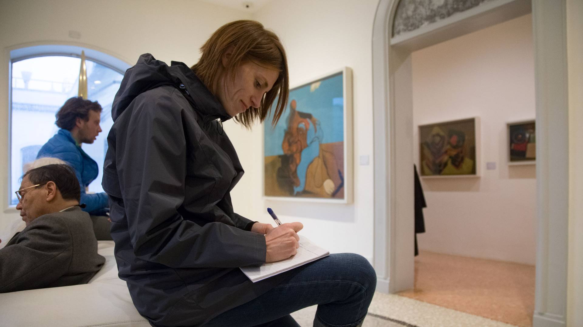 Jamie Reuland taking notes at Peggy Guggenheim Collection in Venice