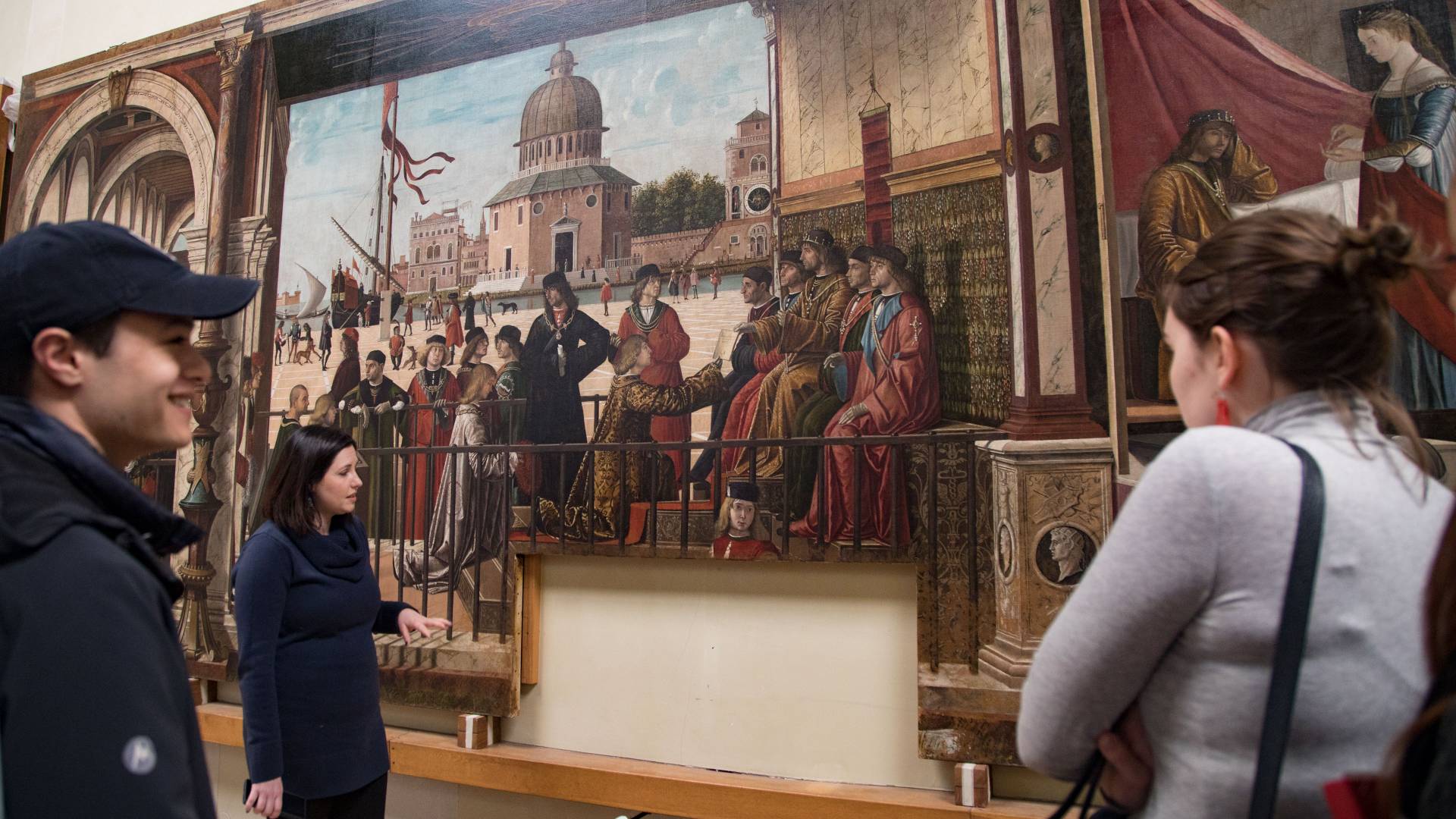 Students looking at artwork being restored in Venice