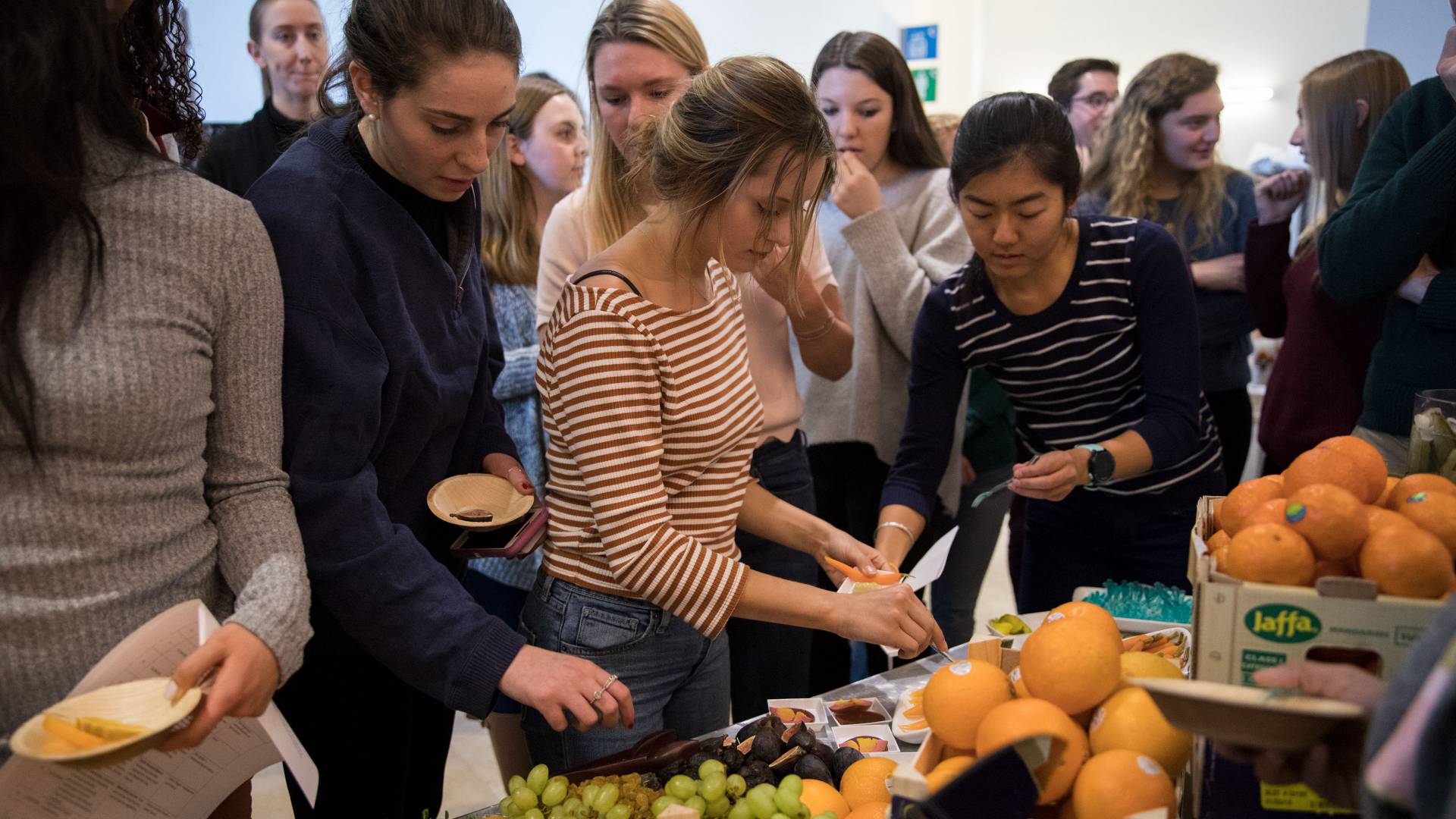 Students putting food on plates