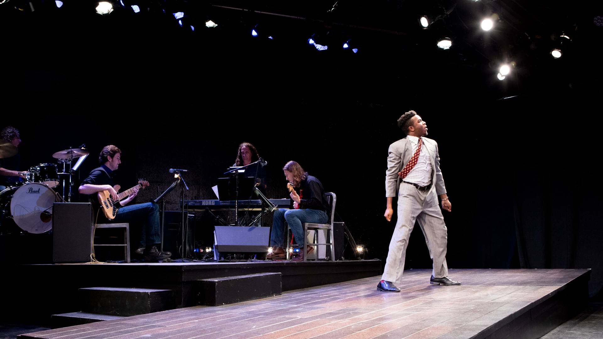 Actors and musicians on stage for musical "Tick, Tick...Boom"