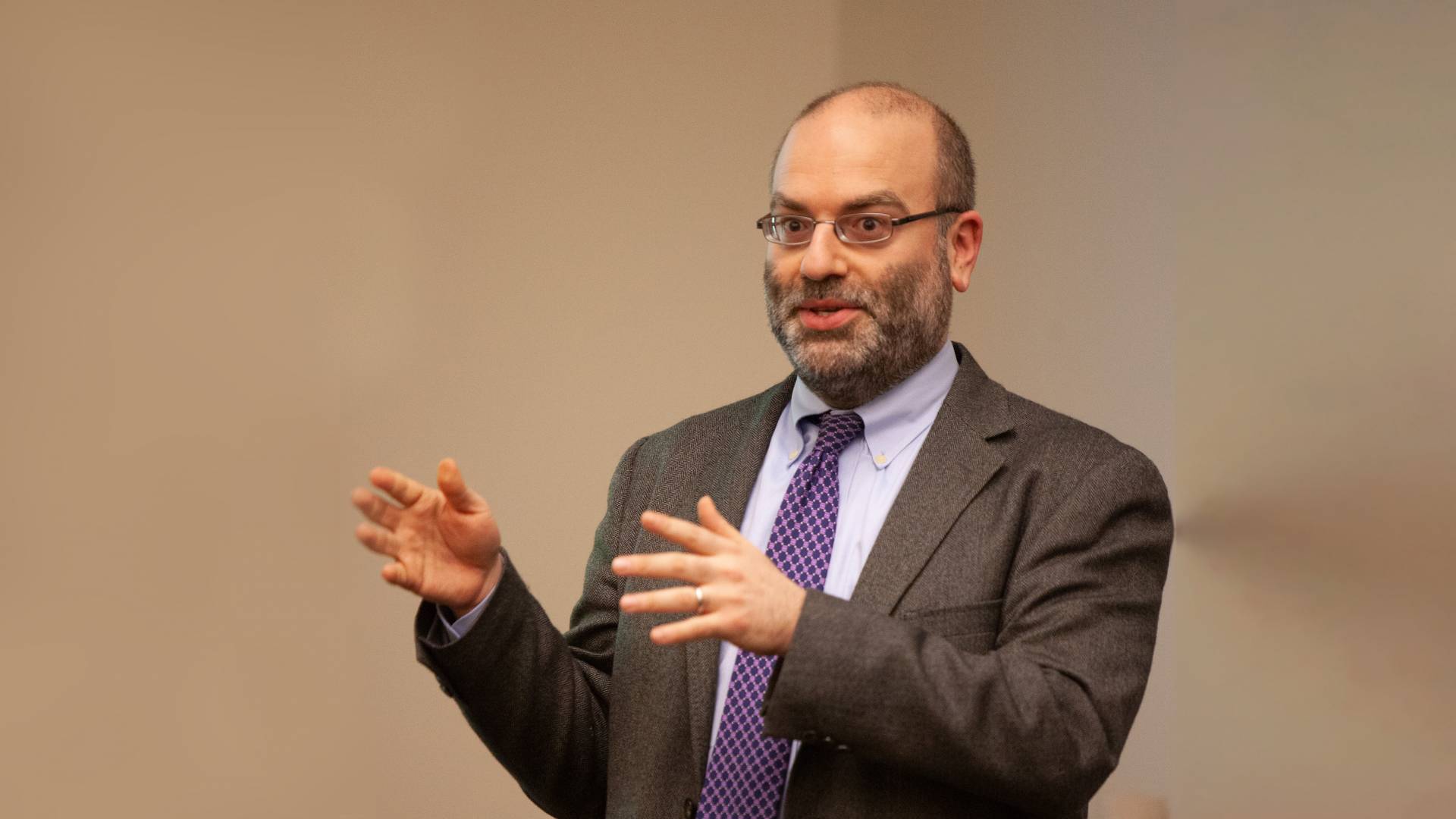 Michael Gordin gesticulates while lecturing