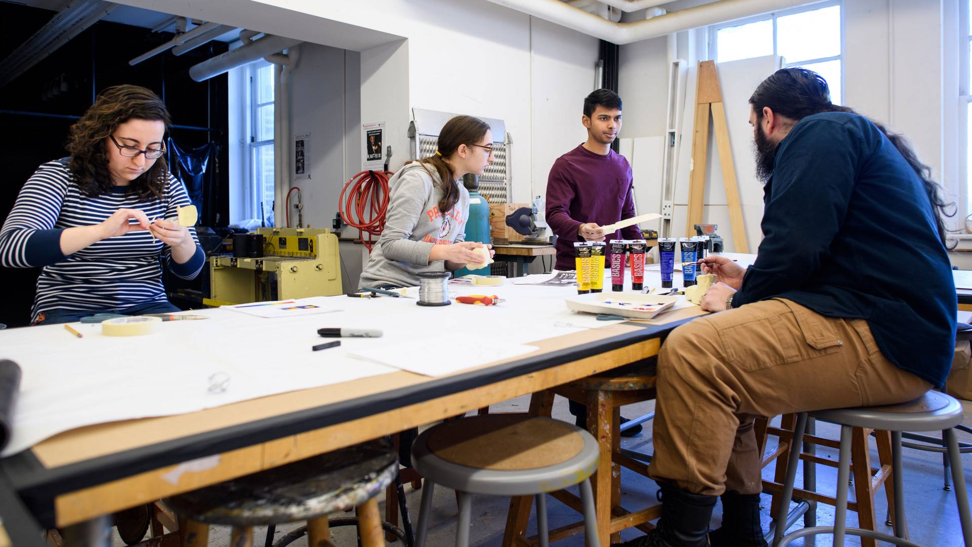 Students working on sculptures during wintersession class