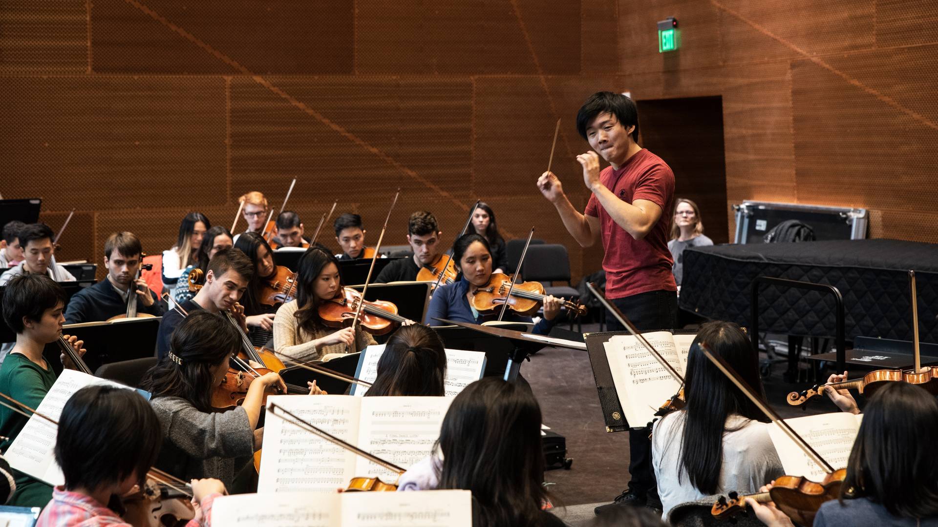 Lou Chen conducting orchestra