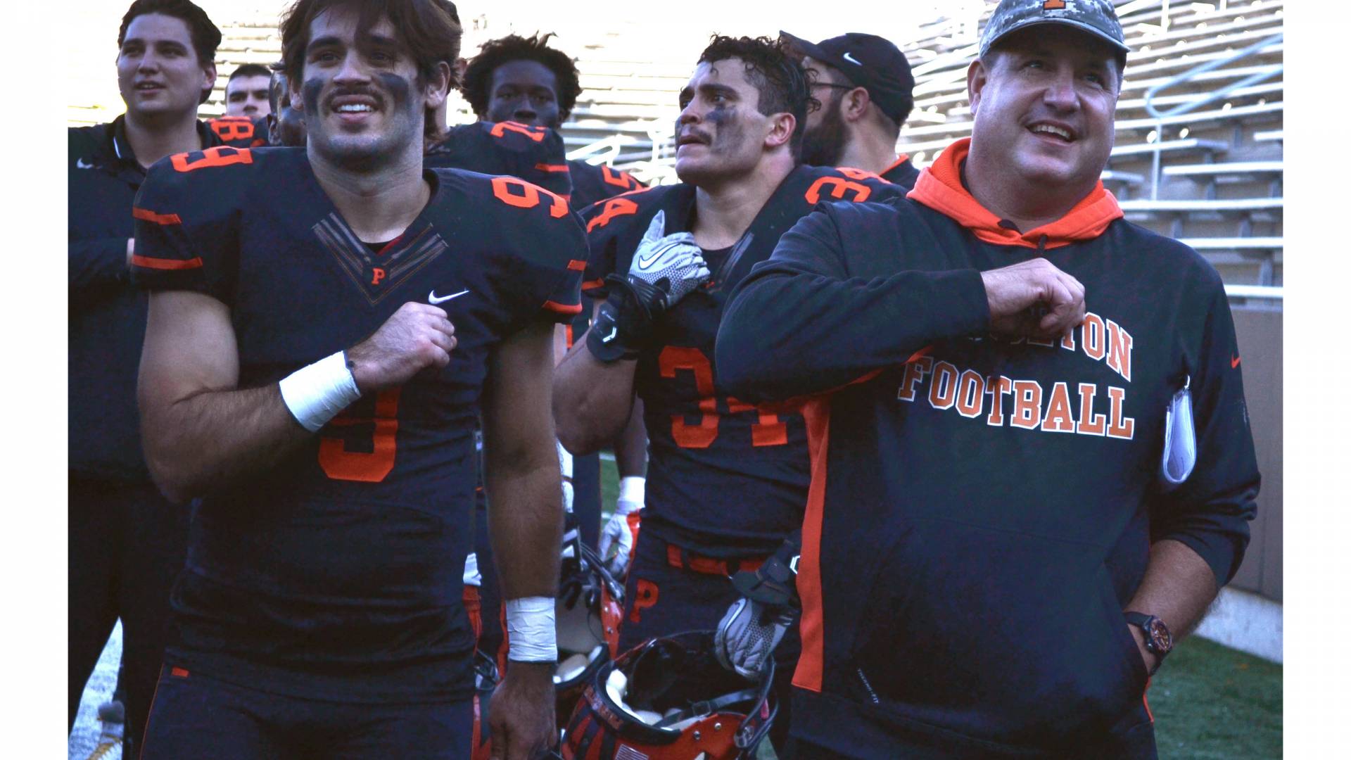 Football team singing school song