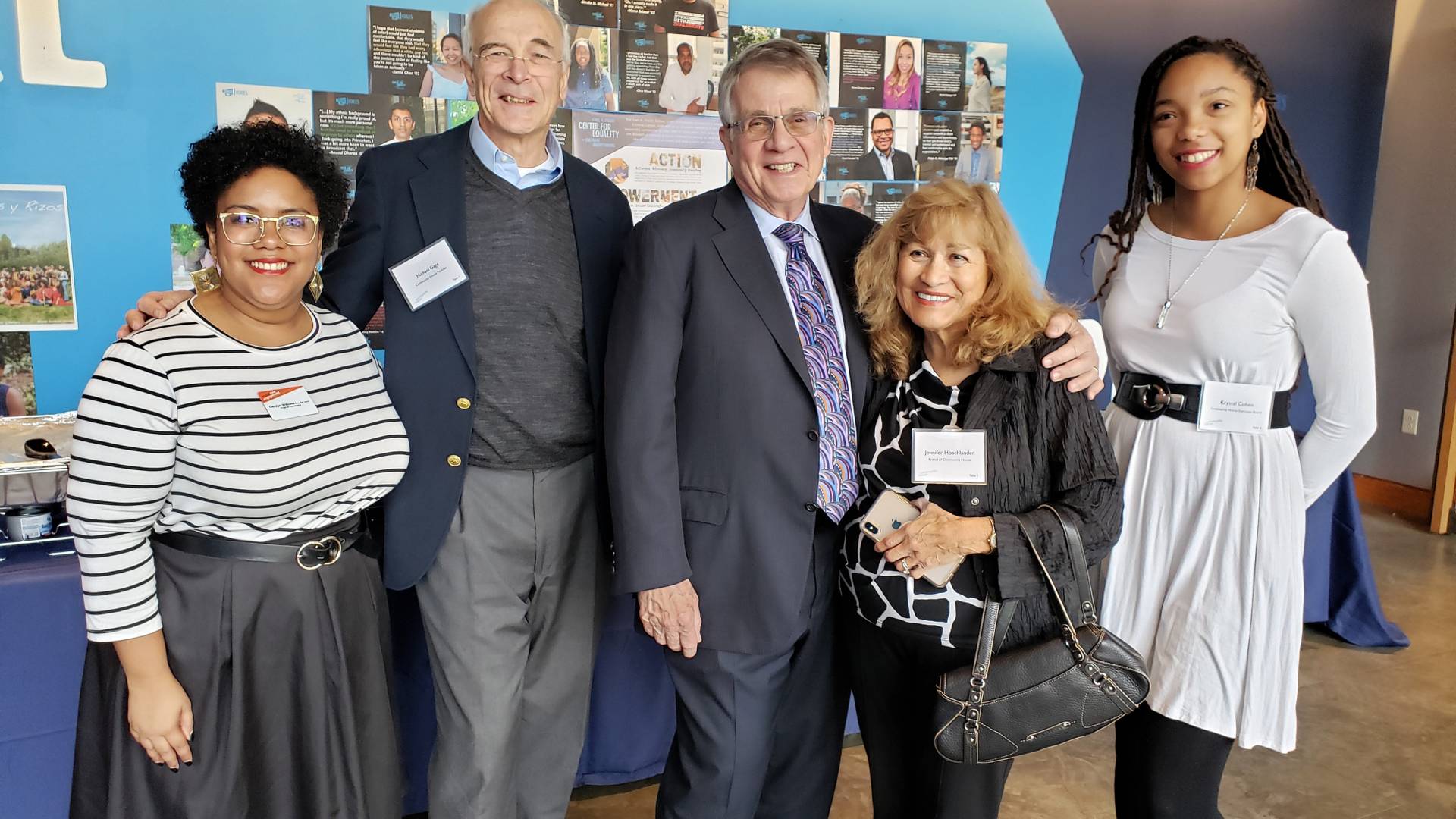 Michael Gage and Gary Hoachlander pose with students and staff