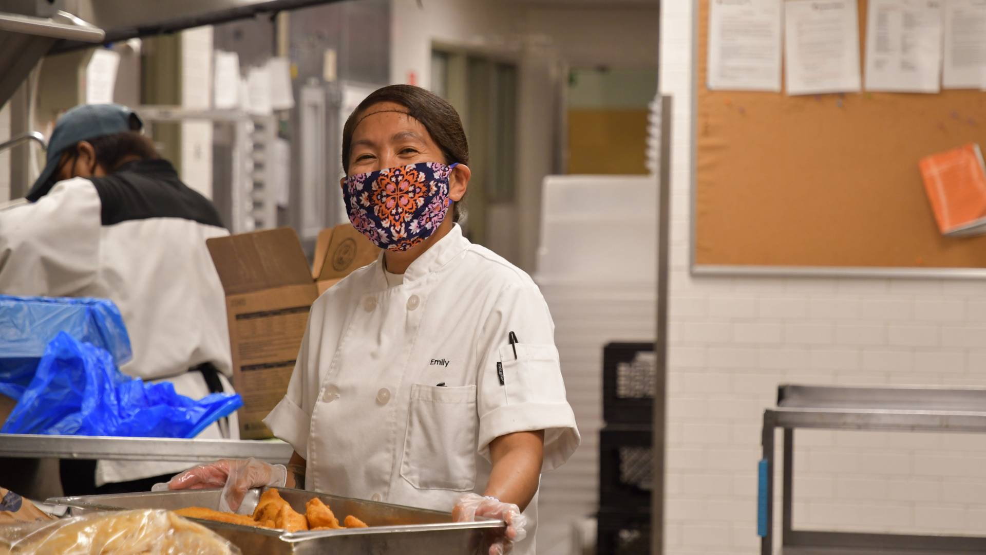 Campus Dining employee smiles
