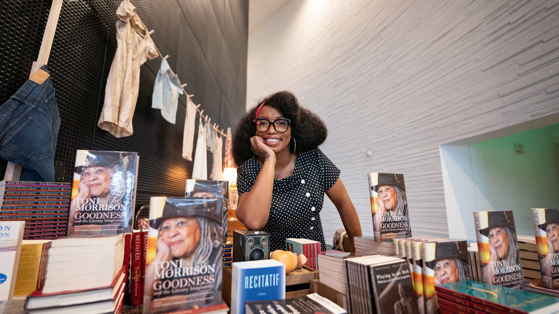 Lady smiling at the Toni Morrison Symposium