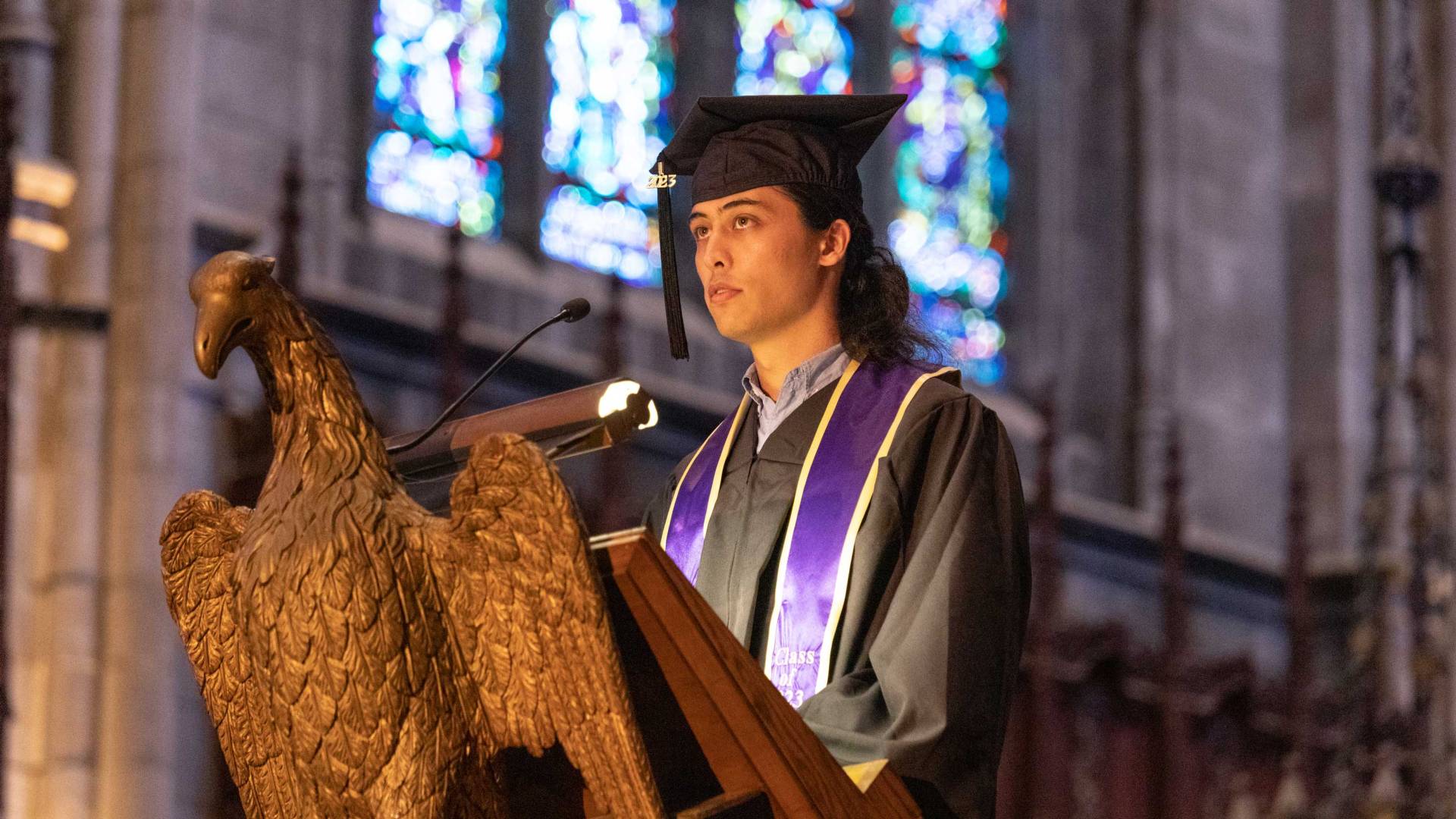 A student reads from the podium