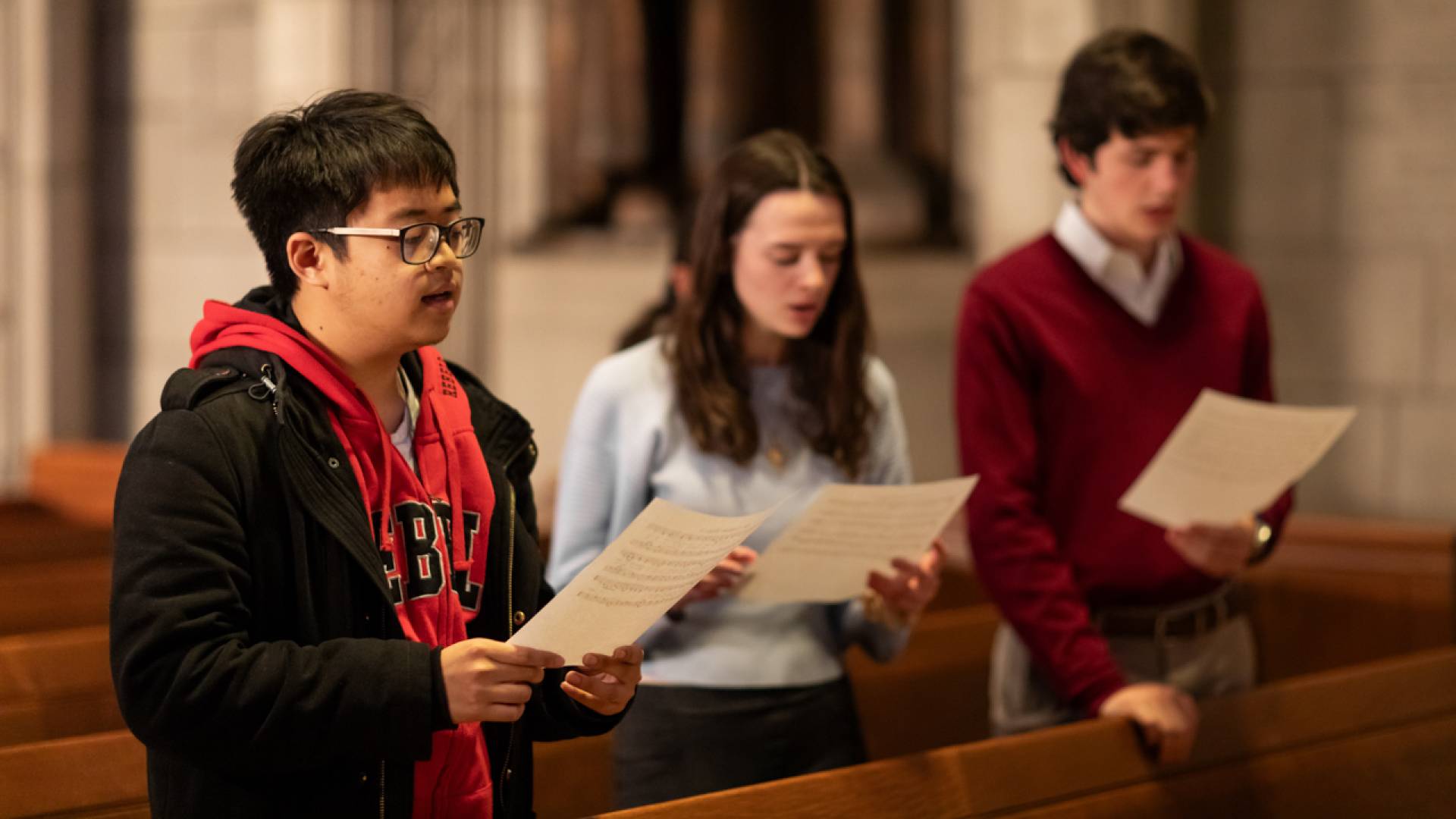 Arthur Acuna holding sheet music