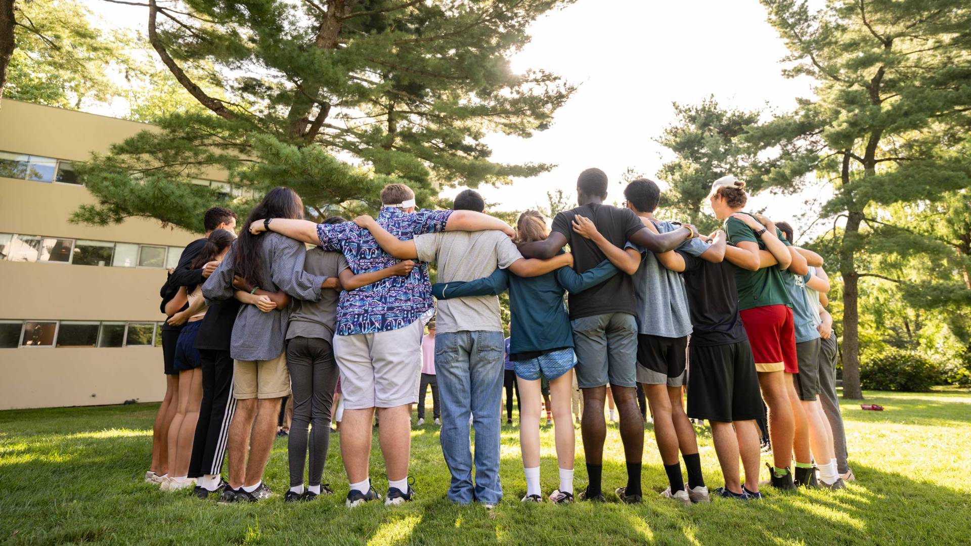 A group of students in a huddle