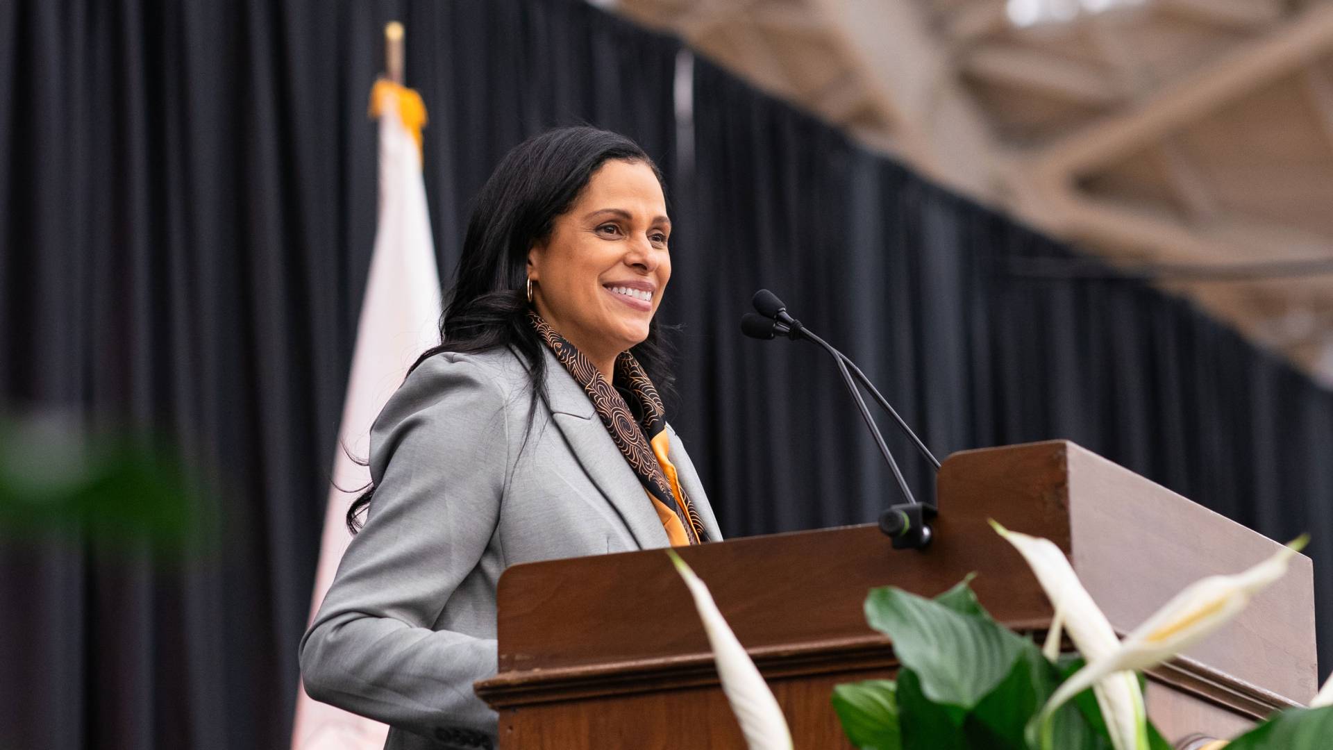 Romy Riddick at the podium