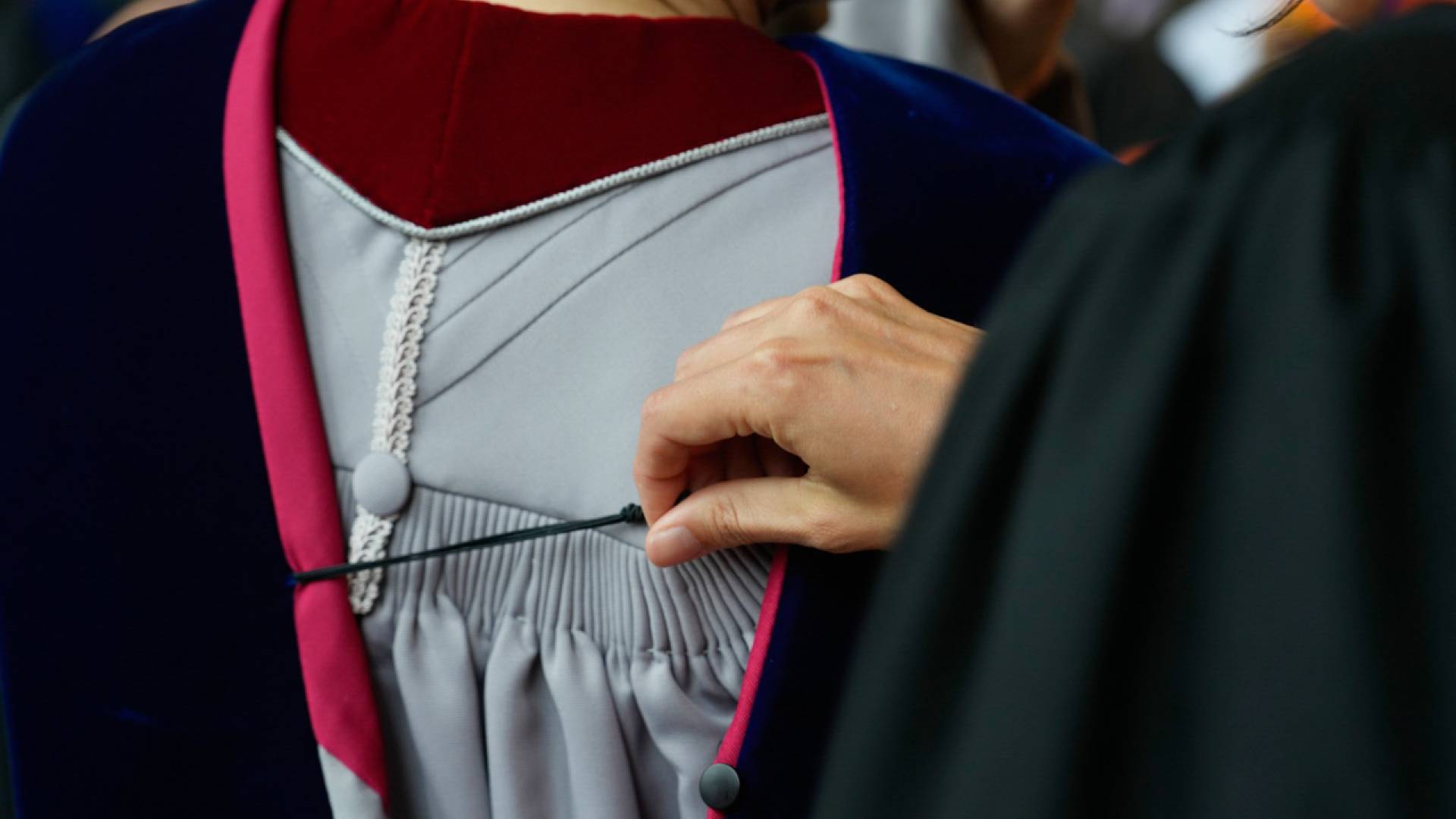 The gowns and hoods of academic regalia trace their history to medieval Europe, when heavy woolen robes were necessary in universities' cold, stone halls.&nbsp;