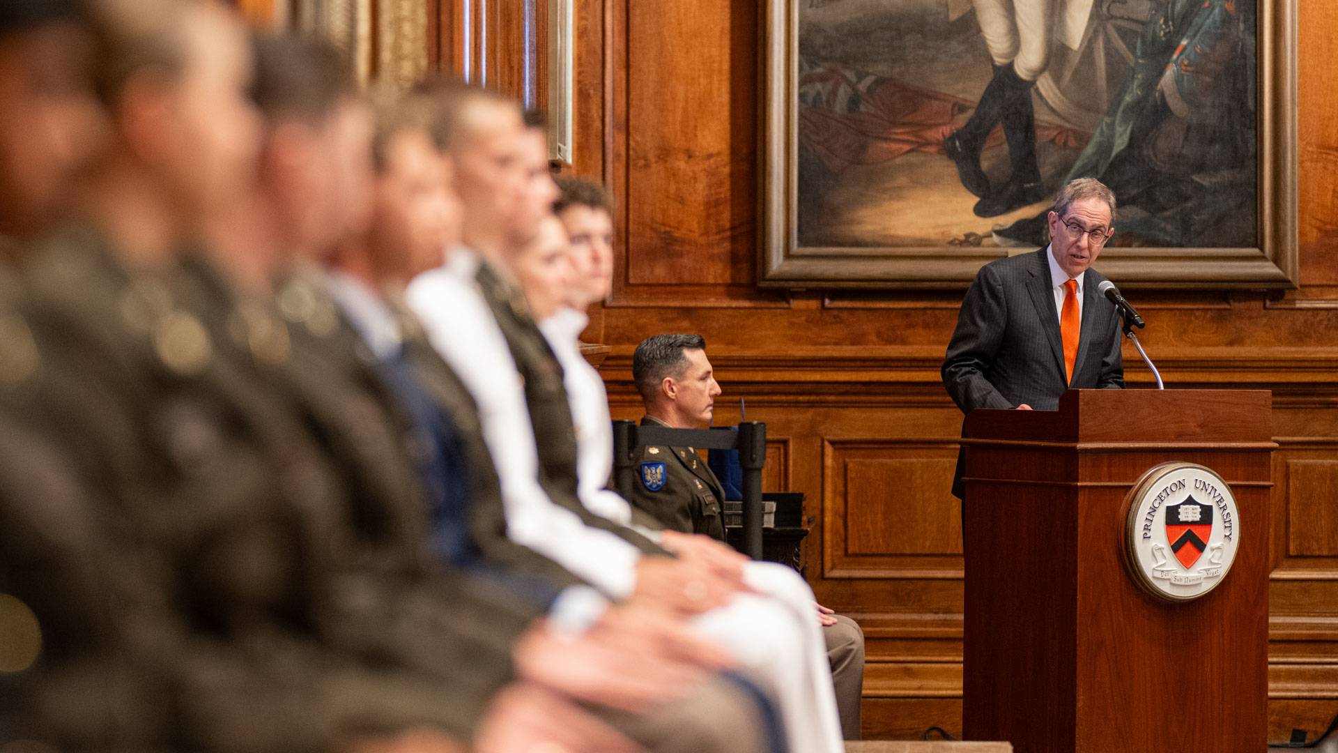 ROTC students sit dignified while Princeton President Christopher L. Eisgruber addresses them.