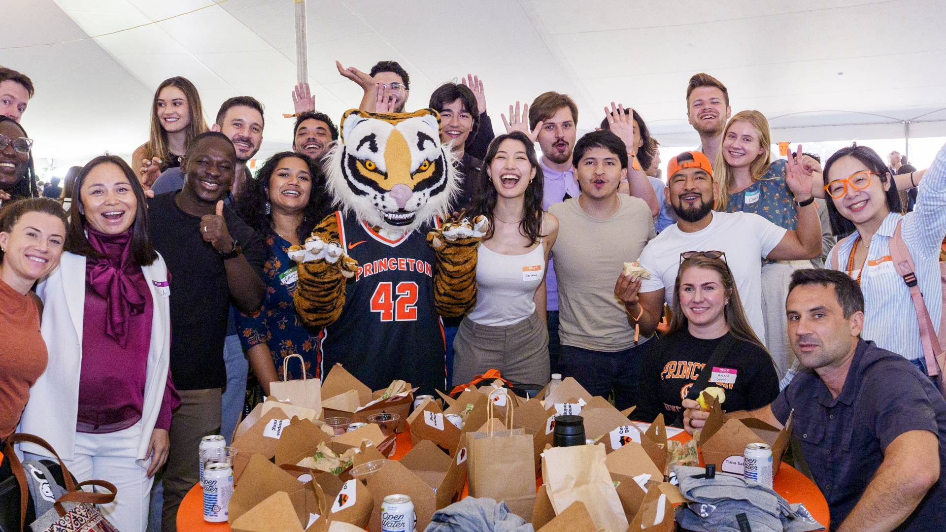 Incoming graduate students pose with the Princeton Tiger mascot.