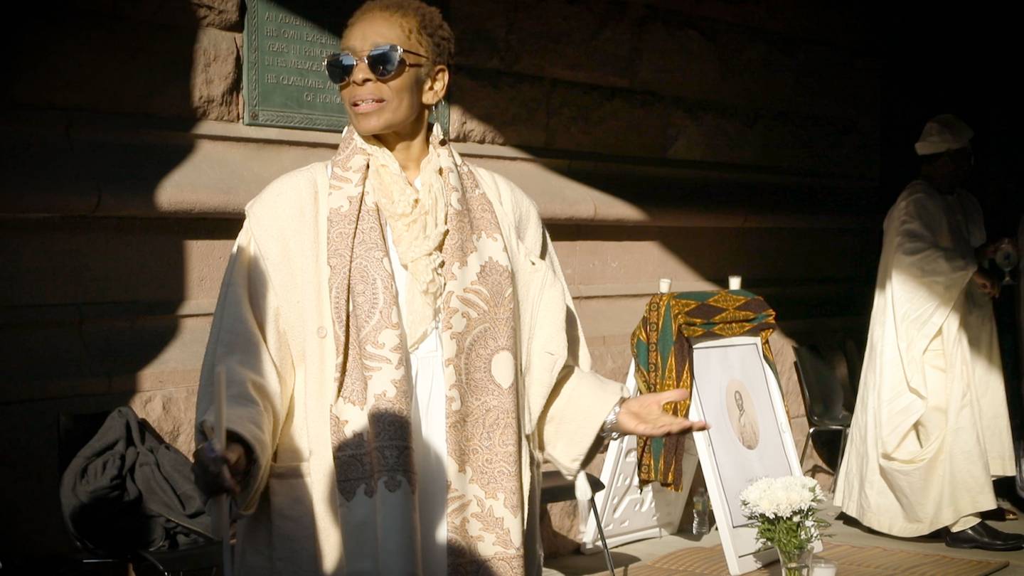 Dyane Harvey-Salaam speaking to crowd during Johnson Arch ceremony