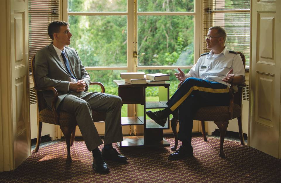 Jared Wigton, a Princeton&nbsp;graduate student in history on leave from the U.S. Army, chats with Lt. Col. Kevin McKiernan, director of the Army Officer Education Program in the Princeton Army ROTC program