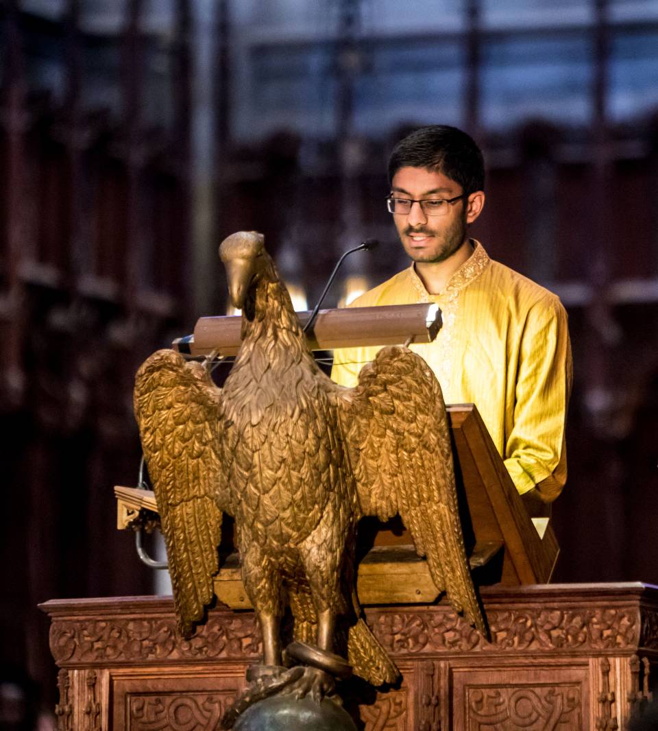 Bhadrajee Hewage giving a reading at podium