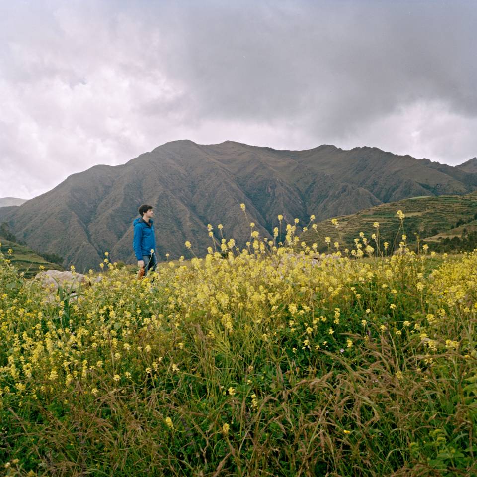 Student standing in field