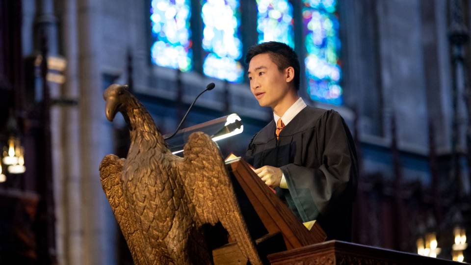 Brandan Joa at podium during Baccalaureate ceremony