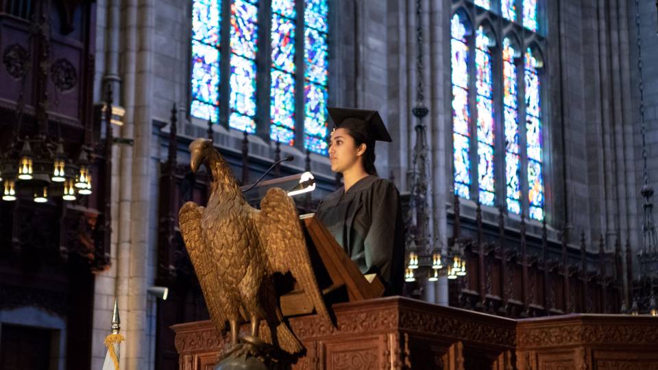 Baljot Ranu  at podium during Baccalaureate ceremony