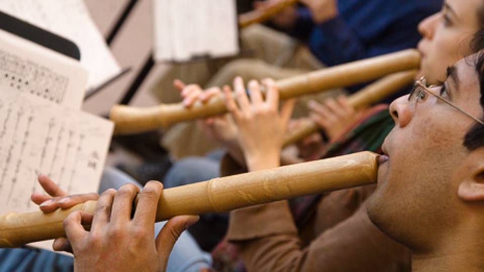 Students playing flutes