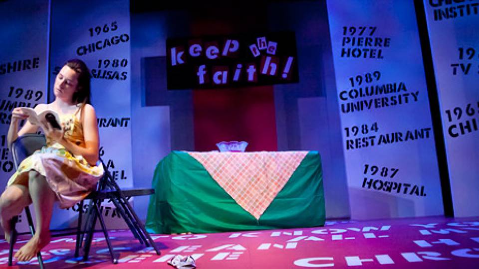 Heidi sitting on stage