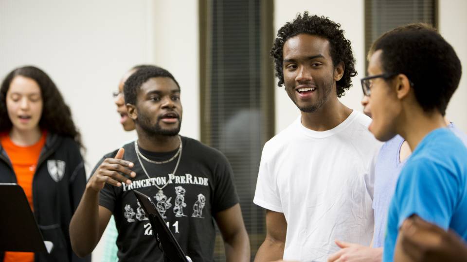 Mikal Walcott, President of the Worship House, seen here with the PU gospel ensemble in Woolworth Hall