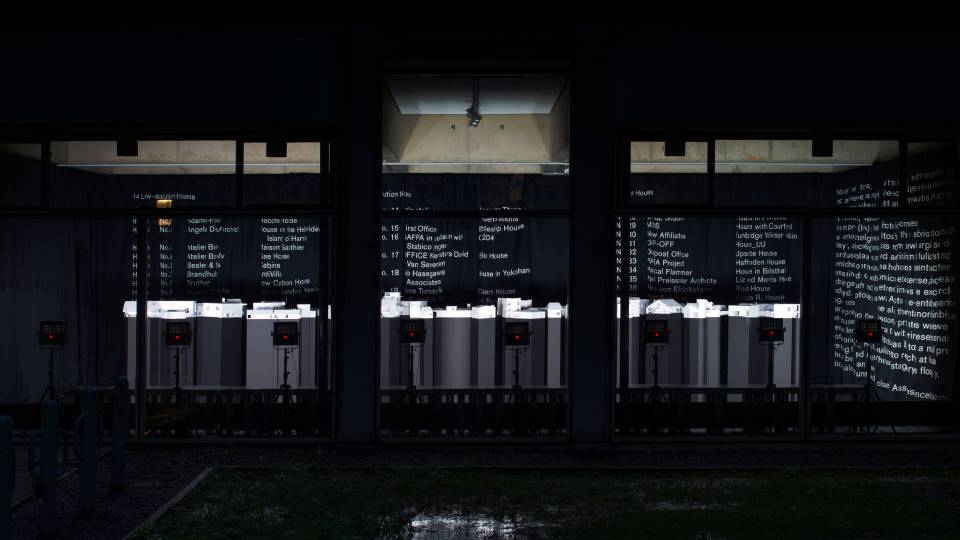 Overview showing all pieces in the architecture exhibit through windows