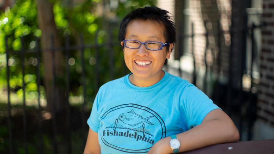 Talia Young wearing a shirt that says "Fishadelphia" on it