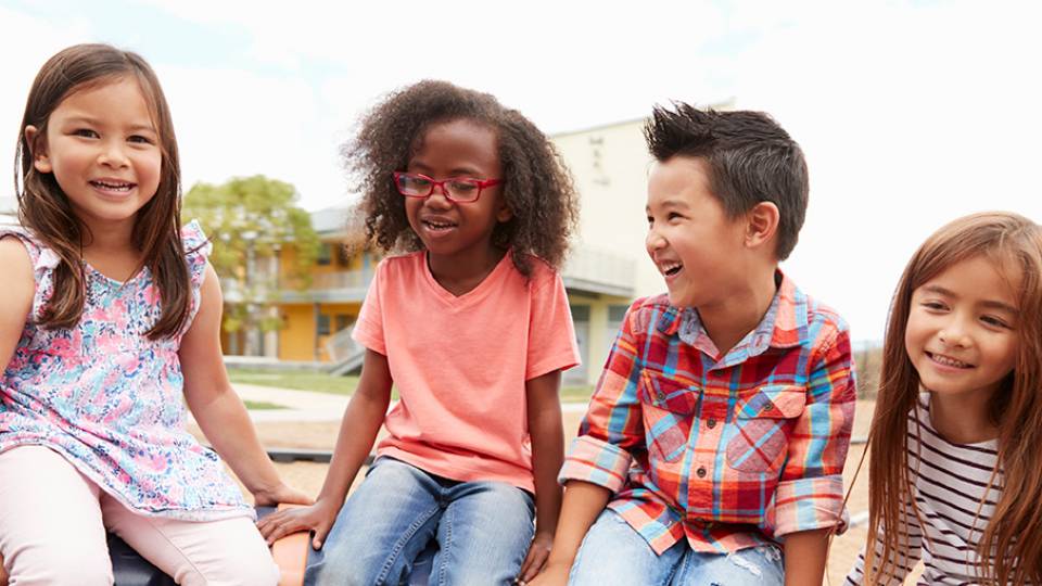 Six children sitting together