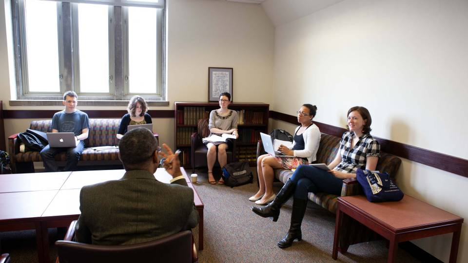 A professor leads a seminar