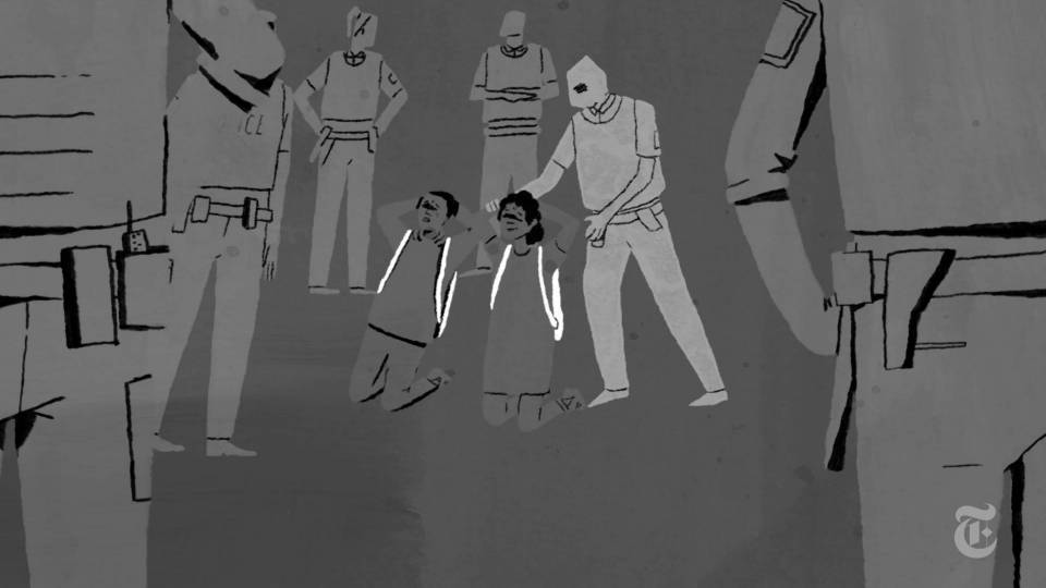 Two children kneel, surrounded by Chicago police