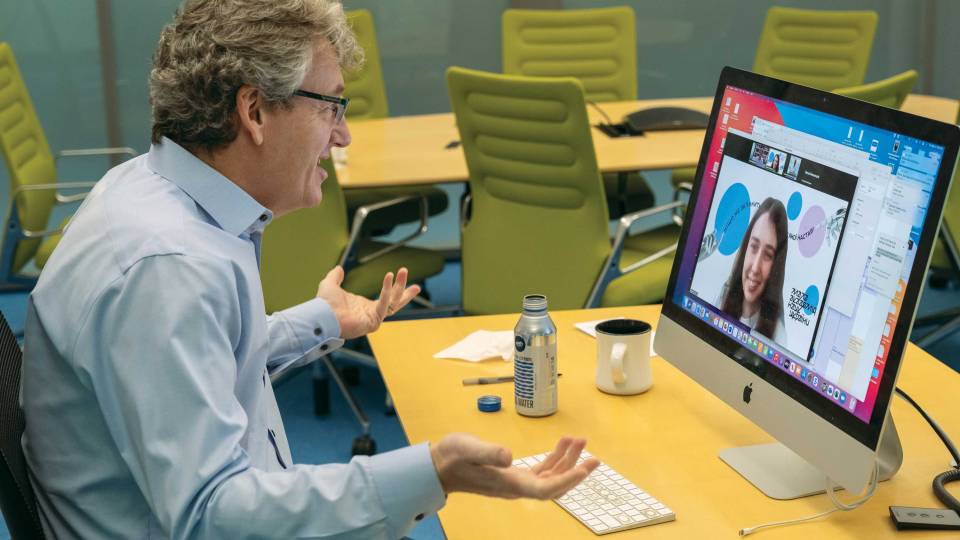 David MacMillan on a zoom meeting with Ukrainian students