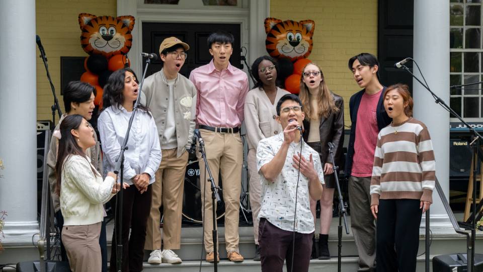 A cappella group performing on stairs