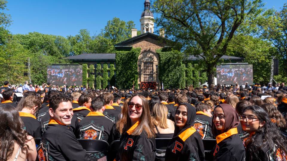 Seniors at Class Day with Nassau Hall in the background.