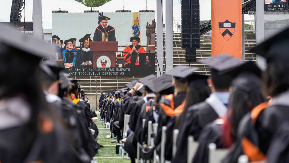 Princeton graduates listen to President Christopher L. Eisgruber’s address during the May 27 Commencement ceremony.