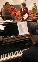 Branker assisting students in class