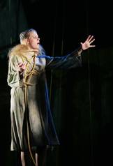 Lily Cowles as the prophetic Holy Fool