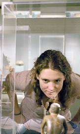 Barron examines a stone figure