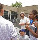 group on deck with panels