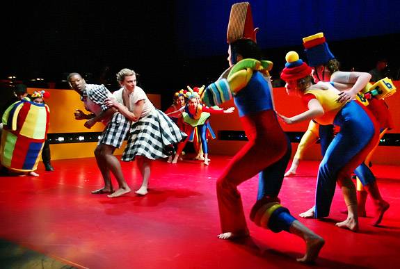 Dancers surrounding couple