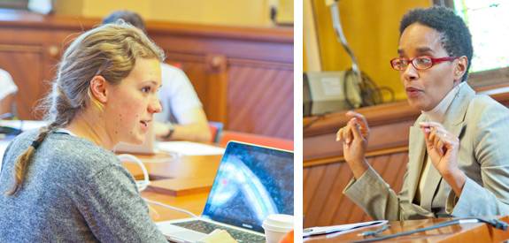 Junior Sarah Morgan and Professor Rouse speaking during class